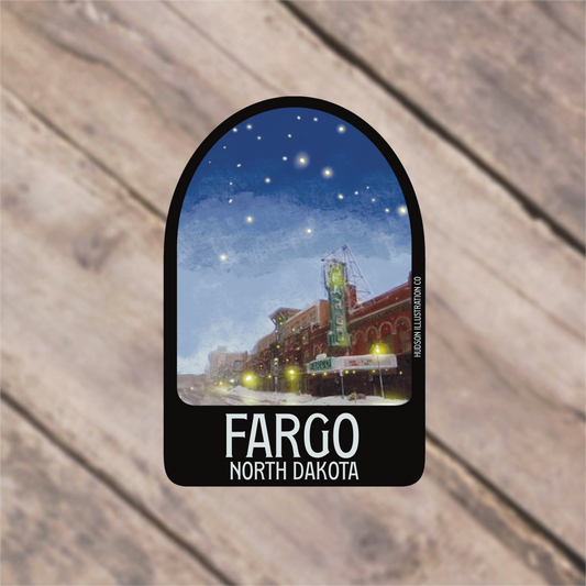 a sticker with a picture of a city at night