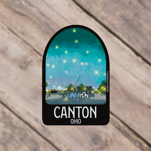 a sticker with a picture of a city at night