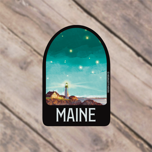 a sticker with a picture of a lighthouse on it