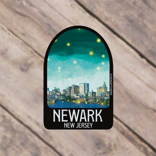 a sticker with a picture of a city at night