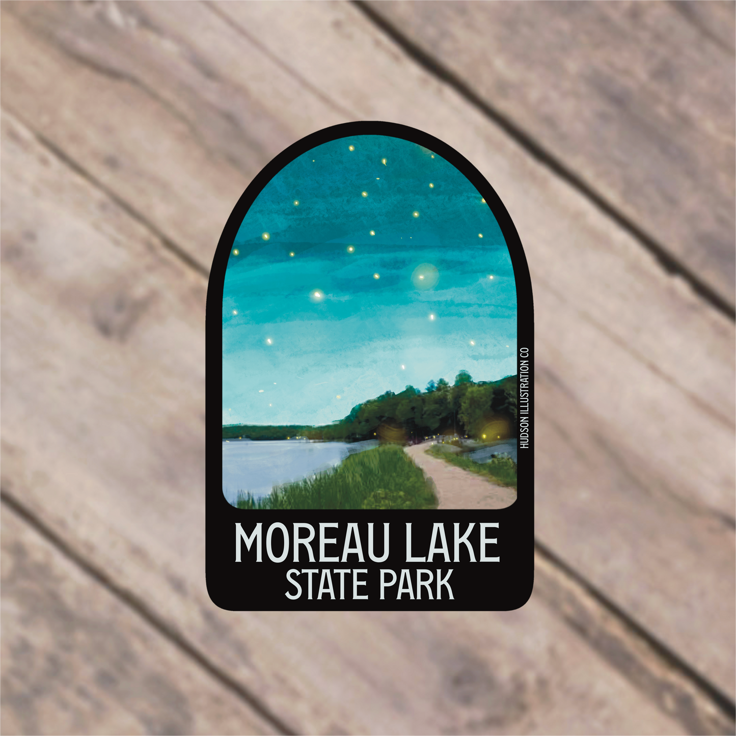 a sticker with a picture of a lake on it