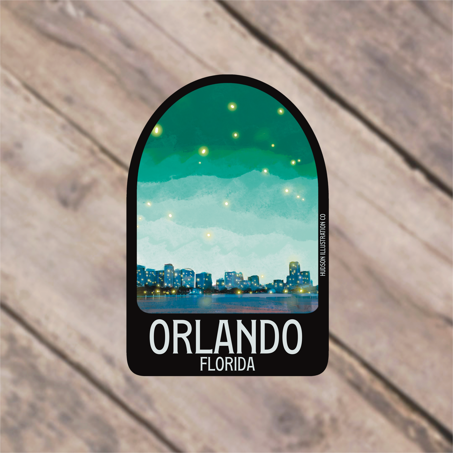 a sticker with a picture of a city at night