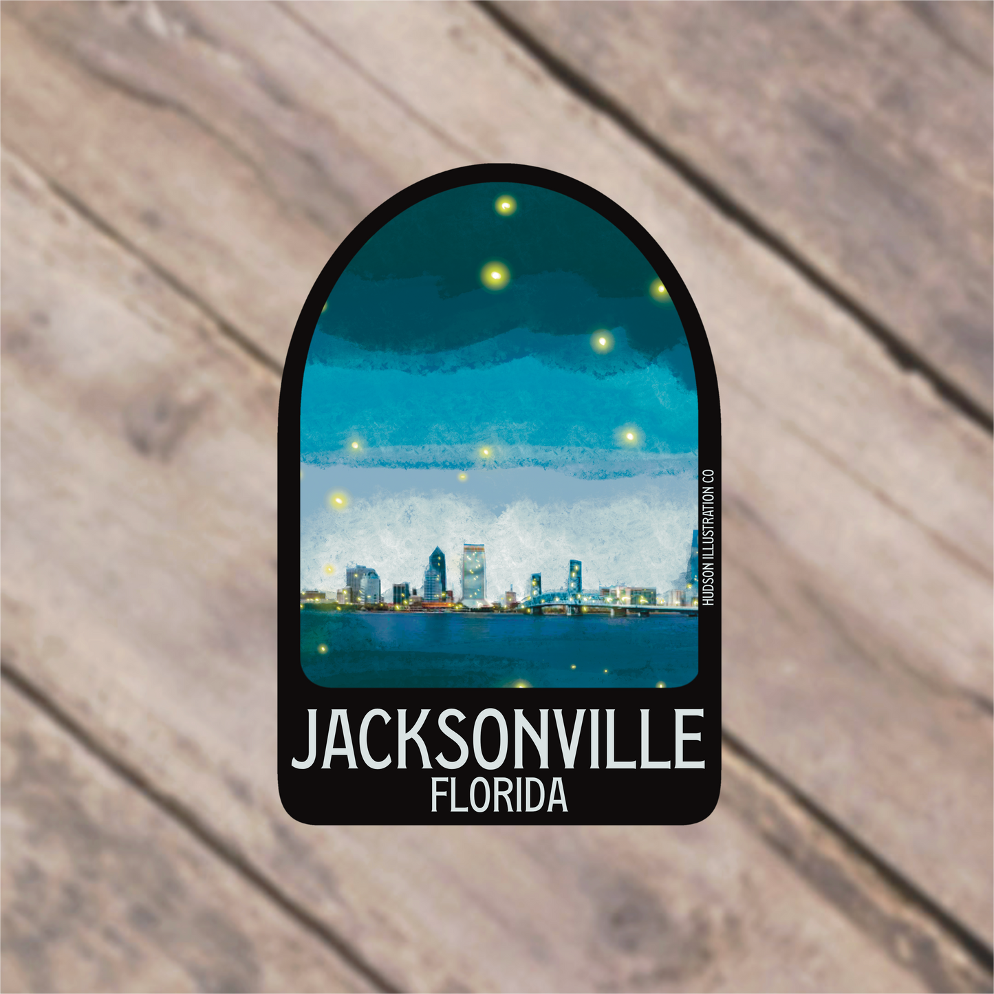 a sticker with a picture of a city skyline