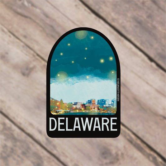 a sticker with a picture of a city in the background