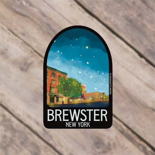 a sticker with a picture of a town on it