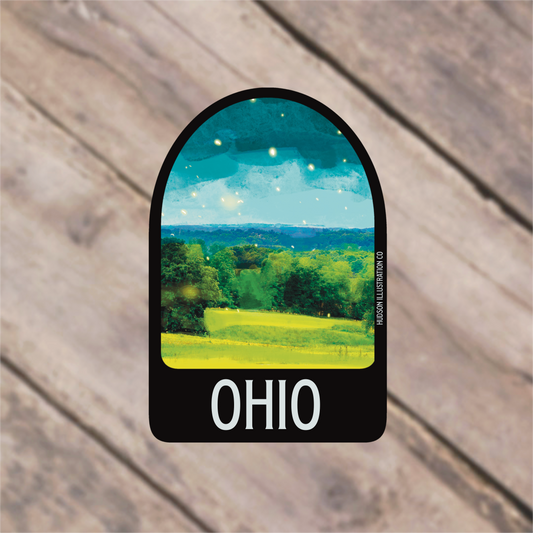 a sticker with a picture of a green field