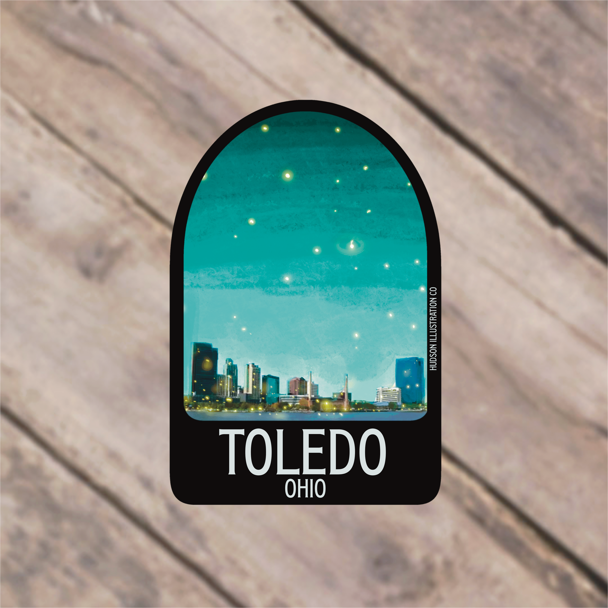 a sticker with a picture of a city skyline