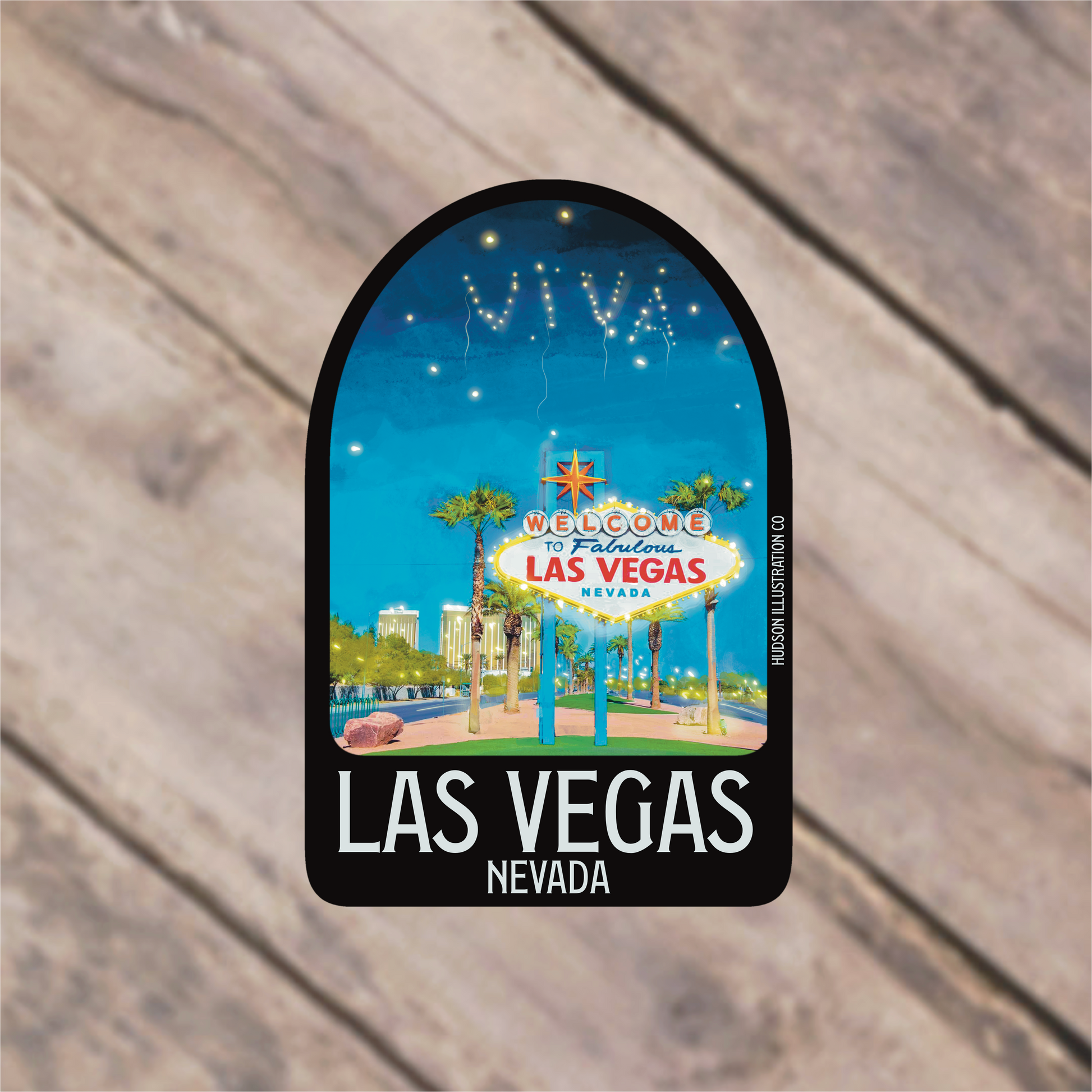 a las vegas sign hanging from the side of a wooden wall