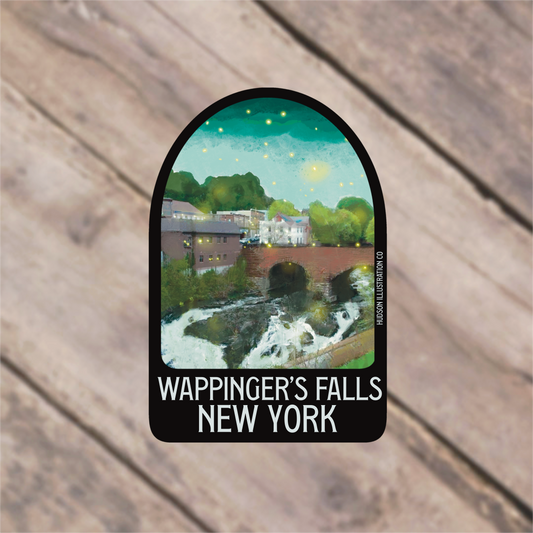 a sticker with a picture of a waterfall and a bridge