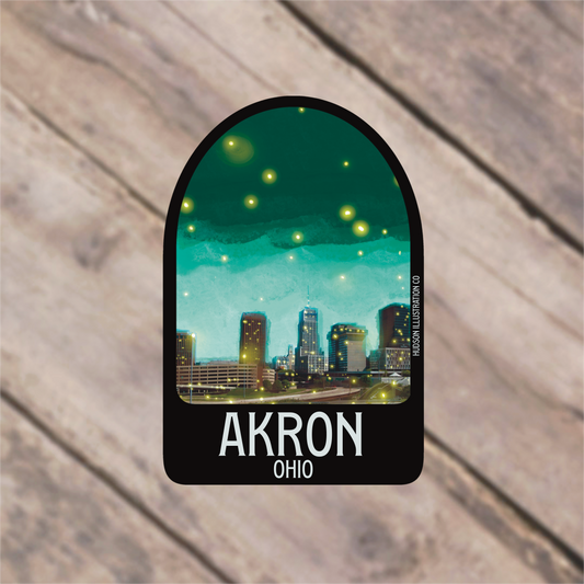 a sticker of a cityscape with the name akron on it