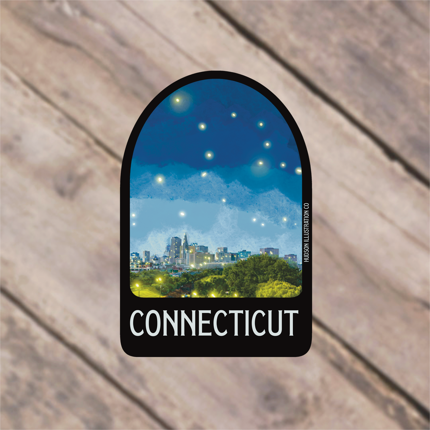 a sticker with a picture of a city at night