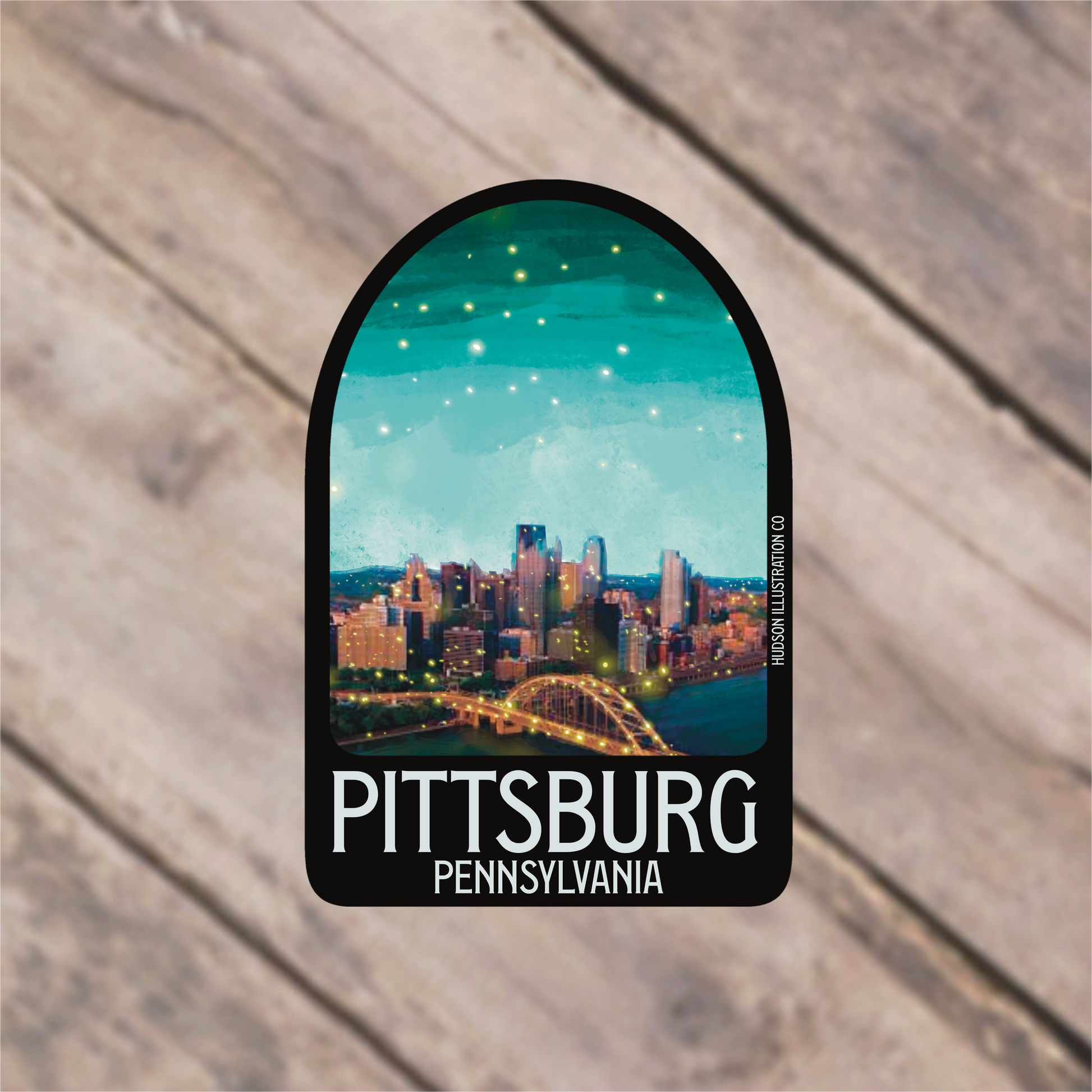 a sticker with a picture of the pittsburgh skyline